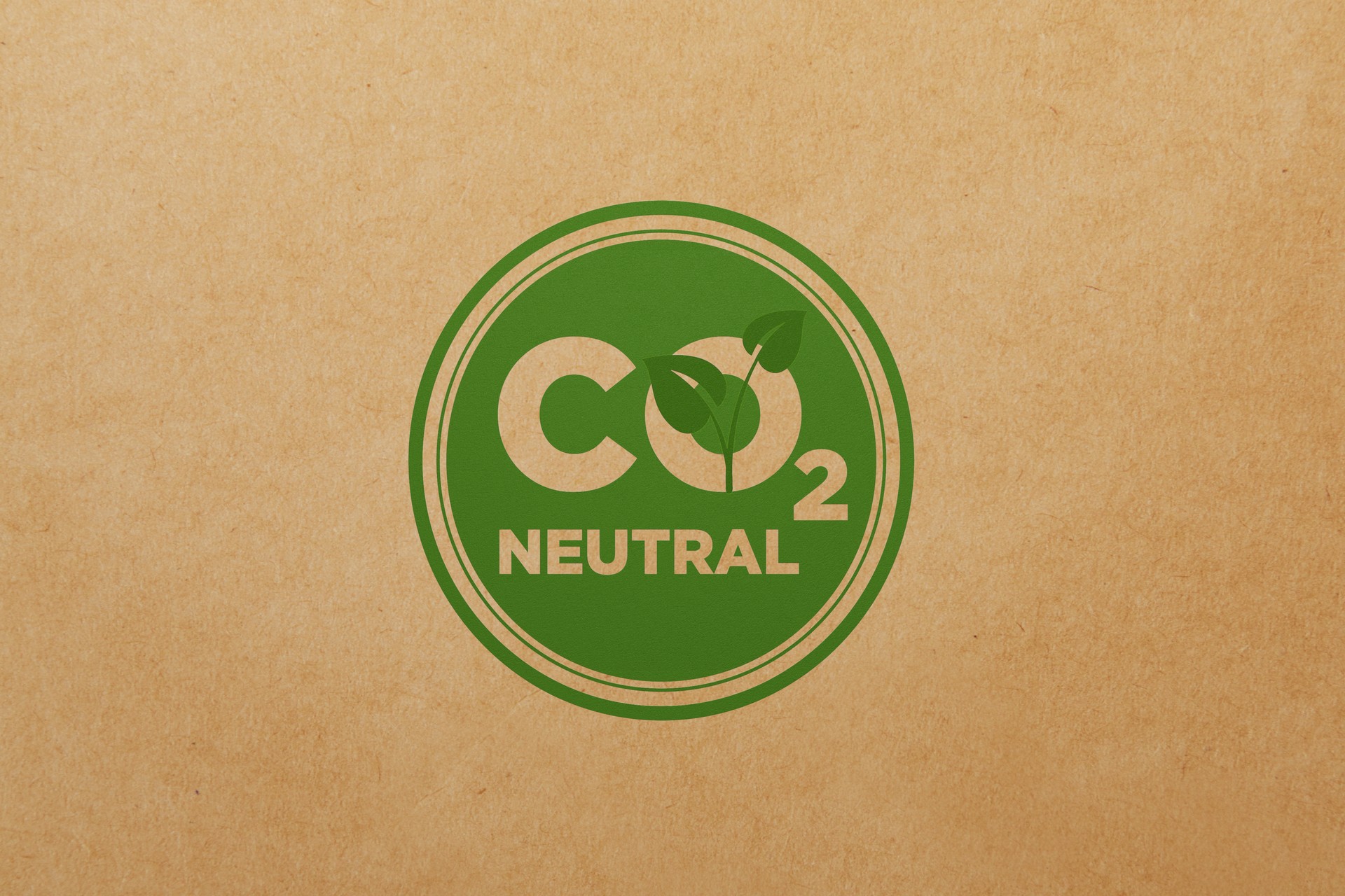 Carbon Neutrality Concept - Green CO2 Neutral Stamp Sitting Over Brown Paper Background